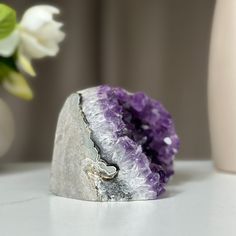 This is a unique Amethyst with unusual druzy cave formations on one side. The stone you will receive is the exact one as in the picture. ✧ MEASURES: Width: 3 in x Height: 3.5 in. Weight 1.8 lb (847 gr) Handmade Amethyst Geodes Gift, Amethyst Geodes Gemstone Gift, Amethyst Geode Raw Stone Gift, Amethyst Geodes Raw Stone As Gift, Amethyst Raw Stone Geodes As Gifts, Unique Amethyst Geodes As Gift, Unique Purple Geodes For Gifts, Healing Amethyst Geodes, Unique Purple Geodes For Gift