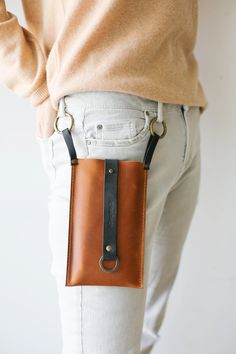 Leather Fanny Pack, Small Leather Bag, Leather Belt Bag, Bag for Phone, Phone Case, Brown Fanny pack Now your phone is totally safe! Exceptional, stylish leather phone bag for those who love to travel light and in style💋 Perfect gift for the loved one or for yourself 🌹 Convertible phone leather bag - Cross body / Waist Bag * Water-splash proof and Durable. * Simple, Elegant * Easy to wear and Travel with. * Can fit iPhone 6/,7/,8/, IPhone X/XS/XR/11 PRO/11 MAX/ 12 Pro Max * The circle hook can Leather Phone Bag, Leather Phone Wallet, Leather Hip Bag, Small Leather Bag, Water Splash, Leather Fanny Pack, Leather Belt Bag, Convertible Bags, Brown Leather Bag