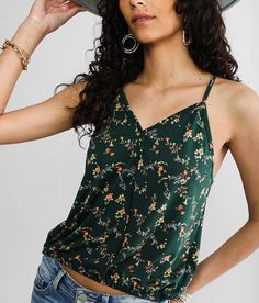 Willow & Root Floral Faux Surplice Tank Top - Green Small, Women's Pineneedle Knit v-neck tank Adjustable straps Elasticized waistband Bust measures 35 on size small Body length up to 20 1/2 on size small Model Info: Height: 5'9 | Bust: 32 | Waist: 22 1/2 | Hip: 34 1/2 | Wearing Size: Small. 90% Polyester 10% Spandex. Machine wash cold gentle cycle with like colors. Use only non-chlorine bleach when needed. Tumble dry low. Cool iron if needed.. Measurements: Bust -Fullest part of bust with arms Tank Top For Women, Women's Tank Tops, Top For Women, 2 On, Tank Tops Women, Tank Top, Buckle, V Neck, Tank Tops