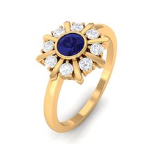 Product Details Shine Bright in Blue with Blue Sapphire Statement Ring. Embellished with Round Shape Blue Sapphire in the center with Diamond stones around it in a Halo, the ring is unique its design and appeal. Product Information SKU SHP-RINGS072210088 Weight 2.56 gm (Approximate) BLUE SAPPHIRE INFORMATION No.of Stones 1 Pieces Total Weight 0.40 Carat (Approximate) Dimension(approx) Round-4X4 mm-1 Pcs Color Blue Cut Brilliant Shape Round Setting Type Bezel Setting Quality Grade AAA DIAMOND INF 18k Yellow Gold Ring, Blue Sapphire Rings, Diamond Stone, Bezel Setting, Yellow Gold Rings, Statement Ring, Sapphire Ring, Blue Sapphire, Statement Rings