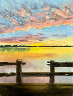 an oil painting of two wooden benches overlooking the water at sunset with clouds in the sky