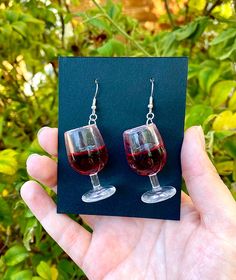 Wine Tour 🍷 These earrings are inspired by the Okanagan Valley! A place adorned by so many wineries, you're bound to go on at least a few wine tours every summer. These babies are attached with a fish hook made of sterling silver.  Designed and made in BC, Canada. All our items are one of a kind, so you can be sure to have the most unique accessories out there. Due to the nature of our products we do not accept returns. Please contact us with any question or concerns. Okanagan Valley, Earrings Summer, Silver Fish, Unique Accessories, Bc Canada, Wine Tour, Unique Gifts For Her, Summer Accessories, Glass Earrings