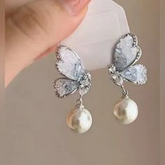 Silver And Blue Butterfly Faux Pearl Dangle Earrings, Nwt Dangly Butterfly Earrings, Blue Butterfly Accessories, Light Blue Earrings, Pretty Earrings Dangle, Butterfly Dangle Earrings, Ball Ideas, Silver Butterfly Earrings, Yule Ball, Baby Blessing