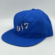 Nine One Seven Call Me 917 Bolt Snapback Skate Hat Blue Made In Usa. Condition Is New Without Tags. Shipped Usps Priority Mail. The Crown Is Unstructured. More Of A Dad Hat With A Flat Brim. Classic Blue Snapback Hat For Streetwear, Classic Blue Snapback Hat, Classic Blue Adjustable Snapback Hat, Vintage Blue Baseball Cap For Summer, Blue Flat Bill Baseball Cap For Summer, Blue Snapback Hat With Short Brim For Summer, Retro Blue Hat For Streetwear, Blue Summer Snapback Hat With Short Brim, Blue Flat Brim Snapback Hat For Summer