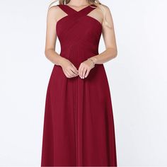 a woman wearing a long red bridesmaid dress with an asymmetrical neckline