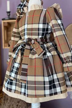 Long Sleeve Brown Plaid Dress For Fall, Winter Plaid Ruffled Dresses, Elegant Plaid Cotton Dress, Brown Ruffled Dresses For Winter, Long Sleeve Plaid Dress With Ruffle Hem, Classic Long Sleeve Brown Dress, Fall Gingham Plaid Dress With Ruffles, Plaid Cotton Dress For Winter, Long Sleeve Cotton Plaid Dress For Fall