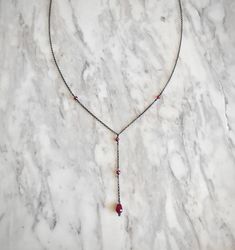 Artemis Dreaming. Βeauty and magic in the most delicately dark way. This necklace is composed of black rhodium over 925 sterling silver delicate sparkling chain, four burgundy garnet gemstones and a tiny burgundy agate drop. You can choose between these chain lengths: 15 / 16 / 17 / 18 inches Not sure which length to buy? We can add a 1 inch extender chain. Just write a note at checkout! ❈ We send all our items with registered mail. ❉ Due to the organic nature of stones, there might be a slight Gothic Jewelry With Pendant And Adjustable Chain, Gothic Sterling Silver Jewelry With Adjustable Chain, Adjustable Gothic Pendant Necklace, Adjustable Gothic Necklace For Gifts, Handmade Gothic Dangle Necklaces, Gothic Dangle Necklaces For Jewelry Making, Gothic Sterling Silver Clavicle Necklace, Gothic Sterling Silver Clavicle Chain Necklace, Gothic Dangle Necklaces As Gifts