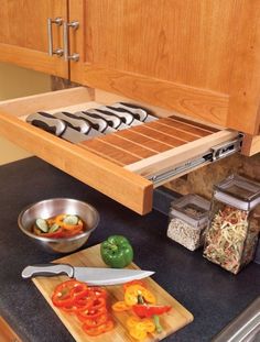 a wooden cutting board sitting on top of a counter