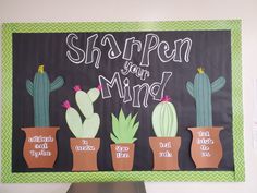 a bulletin board that says sharpe your mind with cacti and succulents