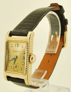 Bulova vintage grade 7AK 49 wrist watch, 21 jewels, distinctive yellow gold (filled) rectangular case with a scalloped design Plate Movement, Arabic Numbers, Ruby Jewel, Gents Watches, Wedges Style, Pocket Watch Chain, Watch Chain, New Bands, Edge Design