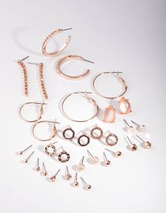 Description
Round out your collection with a fashion-forward earring pack. This set includes 16 rose-gold-toned earrings, with cats eye crystal stones and ball details. Stack and layer to your hearts content!

Largest earring size: 42mm (L) x 3mm (W) 
Smallest earring size: 3mm (L) x 3mm (W)
Weight: 0.5g (one earring) Cats Eye Crystal, Earring Pack, Fashion Jewellery Online, One Earring, Bold Earrings, Cats Eye, Crystal Stones, Large Earrings, Small Earrings