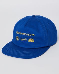 Features:       Style: Cap Colour: Sport Blue Material: 100% Cotton Canvas  Snap back closure  Screen print design to front      Size + Fit Guide:       One Size Travel Merch, Graphic Hats, Caps Design, Baseball Cap Design, Cool Merch, Apparel Design Inspiration, Cool Album Covers, Retro Hats