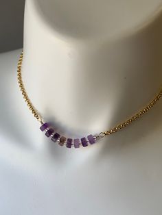 "Amethyst bar chain necklace/ Amethyst bar choker/ aesthetic necklace/ minimalist choker/ minimalist jewelry/ handmade jewelry Beautiful Amethyst rondelles are hand wired wrapped to a Rolo gold plated chain creating this one of a kind choker necklace.  This necklace is 14.5 \"  This necklace is also part of a triple set, could be also found in our Etsy shop.  A great chain to layer with other chains or necklaces.  This is a great Holiday gift.  Free shipping in the USA  What is Amethyst:  Amethy Trendy Purple Clavicle Chain Necklace, Trendy Purple Necklace For Gift, Trendy Purple Necklace For Gifts, Metal Clavicle Chain Jewelry As Gift For Her, Metal Clavicle Chain Jewelry Gift For Her, Trendy Purple Jewelry For Gift, Gold Amethyst Jewelry With Delicate Chain, Trendy Choker Jewelry For Gifts, Adjustable Clavicle Chain Jewelry As A Gift For Her