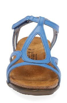 A graceful teardrop modifies a breezy T-strap sandal finished with a slim hook-and-loop strap closure. Flat sole American Podiatric Medical Association (APMA) Seal of Acceptance Leather upper and lining/rubber sole Imported Blue Sandals With Heel Loop And Single Toe Strap, Spring T-strap Sandals With Arch Support, Leather T-strap Sandals With Arch Support, Adjustable T-strap Sandals With Arch Support, Blue Leather Sandals With Arch Support, Adjustable Blue Sandals With Arch Support, Blue Adjustable T-strap Sandals, Blue Sandals With Cushioned Footbed And Single Toe Strap, Black Raven