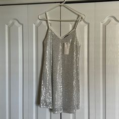 Brand New, Never Worn With Tag Attached. Purchased From An Online Boutique, Size Small. Silver Sequins On Front And Back. Light Weight Material, Adjustable Shoulder Straps. Silver Sequin Mini Dress, Sequin Slip Dress, Pop Style, Back Light, Bow Detail Dress, Trapeze Dress, Mod Dress, Sequin Mini, Sheer Chiffon