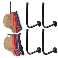 four pairs of socks hanging from hooks