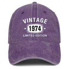 a purple hat that says vintage 1974 limited edition on the front, and white lettering