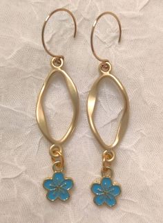 SWEET ARTISAN HANDMADE ENAMELED FLOWER EARRINGS HANGING FROM TWISTED MATTE GOLD