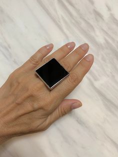 Modern Black Ring With Rectangular Stone, Modern Black Jewelry With Rectangular Stone, Modern Onyx Signet Ring Gift, Minimalist Rectangular Onyx Jewelry, Modern Onyx Ring Gift, Modern Onyx Signet Ring For Gift, Rectangular Onyx Rings For Gift, Black Sterling Silver Rectangular Signet Ring, Minimalist Black Square Jewelry