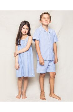 Keep your little one cool and comfy in these short pajamas cut from cotton-blend striped fabric with an airy puckered weave and a cozy brushed softness. Meets Consumer Product Safety Commission's flammability standards for children's sleepwear Top has front button closure; chest patch pocket 50% cotton, 50% modacrylic Machine wash, tumble dry Imported Kids' Wear Seersucker Shorts, French Blue, Striped Fabrics, Short Set, Getting Cozy, Striped Shorts, Kids Wear, Short Sets, Night Gown