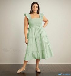 Orcajump - High-waisted Sleeveless Ruffle Hem Dress with Mandarin Collar Green Sleeveless Ruffled Sundress, Green Sleeveless Sundress With Ruffles, Casual Sleeveless Ruffled Sundress, Casual Sleeveless Sundress With Ruffles, Casual Midi Dress With Ruffled Straps, Casual Sleeveless Midi Dress With Ruffle Hem, Green Sleeveless Midi Dress With Smocked Bodice, Casual Sleeveless Dress With Ruffled Straps For Brunch, Sleeveless Green Dress With Smocked Bodice