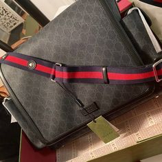 Condition: Used, Like New! Comes With Never Used Changing Pad, Includes Box And Dust Bag No Lowballers, ***Price Is Firm Due To Poshmark Fees From Total*** A Baby Changing Bag In Black/Grey Gg Supreme Canvas. First Used In The 1970s, The Gg Logo Was An Evolution Of The Original Gucci Rhombi Design From The 1930s, And From Then It's Been An Established Symbol Of Gucci's Heritage. For Cruise 2018, The Gg Pattern Has Been Brought Back To The Forefront In New Combinations, Paying Homage To Gucci's R Designer Shoulder Bag With Logo For Travel, Luxury Black Bag With Designer Logo, Designer Gucci Bag, Designer Gucci Bag With Logo, Rhombus Design, Designer Shoulder Bag, Baby Changing Bags, Gg Logo, Changing Bag