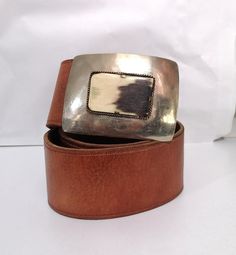 Vintage Brown Leather Belt, Boho Woman Leather Belt, Camel Belt, Waist Leather Belt, Metal and Bone buckle, Texan Style  The belt is in very good condition, a little bit signs of wear and use Wide: 5 cm/ 2 in Lenght: 107 cm / 42 in Fit to waist: 88-99 cm / 36-39 in Materials: leather Condition: very good vintage condition At the customer's request, additional holes can be made for a smaller waist See more like this in my shop: https://www.etsy.com/shop/VintageInsparation?ref=seller-platform-mcna Boho Woman, Smaller Waist, Brown Leather Belt, Boho Women, Small Waist, Upcycle Clothes, Vintage Brown, Leather Belt, Leather Women