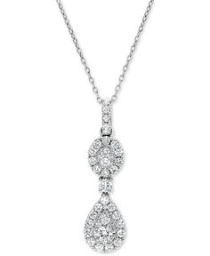 A duet of beautiful clusters, one oval-shaped and one teardrop radiate stunning round-cut diamond sparkle on this ultra-glamorous diamond pendant necklace set in luxurious 14k white gold. 2023 Art, Pendant Diamond, Fashion Pendant, Double Halo, Jewelry Repair, Diamond Pendant Necklace, Round Cut Diamond, Diamond Pendant, Online Jewelry