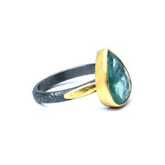 -PRODUCT TYPE - COLORED STONE RINGS -MATERIAL - 18K GOLD AND SILVER -PURITY - 18 K GOLD AND 925 SILVER -STONE - EMERALD -SHAPE - PEAR -AVAILABLE SIZES - (US) - 5 / 5.25 / 5.5 / 5.75 / 6 / 6.25 / 6.5 / 6.75 / 7 / 7.25 / 7.5 / 7.75 / 8 -TOTAL WEIGHT - 3.790 GRAMS -GOLD WEIGHT - 18 K - 1.280 GRAMS -SILVER - 1.910 GRAMS -EMERALD - 3.00 CARAT - This piece signifies simplicity that itself is sign of class. In the amidst of such cheap quality stones here, we present the most beautiful emerald stone wit Gold Teardrop Emerald Ring, Gold Teardrop Emerald Promise Ring, Handmade Yellow Gold Teardrop Ring, Unique Sterling Silver Emerald Ring With Gold Plating, Unique Gold Emerald Ring In Sterling Silver, Unique Gold Emerald Ring With Bezel Setting, Hand Forged Green Emerald Ring As Gift, Emerald Teardrop Rings For Gifts, Hand Forged Green Emerald Ring Gift