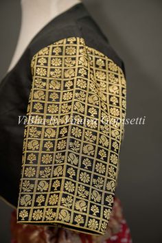 This black blouse is hand-painted on raw silk with a beautiful Radha Krishna motif and embellished with embroidery and Benares brocade sleeves. It provides a versatile style, perfect for mixing and matching with multiple sarees. Its 3/4th sleeves give this blouse a modern, sophisticated silhouette and style to your wardrobe this festive season. Hand Painted Blouse, Painted Blouse, Floral Sleeve, Designer Blouses, Black Hand, Kids Pants, Radha Krishna, Raw Silk, Versatile Style