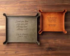 two personalized trays on a wooden table