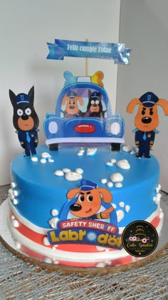 a birthday cake with cartoon characters on it