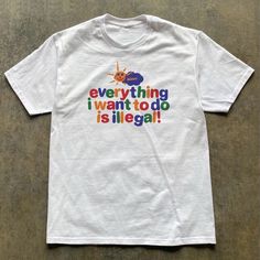 Everything I Want To Do Is Illegal T-Shirt Fast Shipping $25 Lowest I Can Do Custom Deadstock Hit Me With Questions Meme T Shirts Design, Im Lovin It Shirt, Chaotic Shirts, Bi Outfits, Clowncore Shirt, Kidcore Shirt, Bleach Jeans, Silly Shirts, Clown Shirt