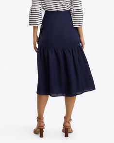 Give it a twirl. Our 100% Linen Midi Skirt combines a ladylike shape with a lightweight, easy-to-wear fabric, making it a perfect warm-weather partner for everything from button-ups to tank tops to T-shirts.  ======== Linen 100% Linen Lining: 100% Polyester  Length: 29 3/4" Side seam zipper Lined If between sizes, size Linen Skirt Midi, Linen Midi Skirt, Casual Date Night, Navy Linen, Draper James, Fabric Making, Skirt Midi, Casual Date, Linen Skirt