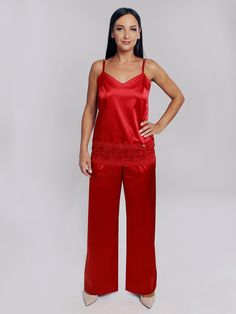 * High quality classic red satin top with red lace trim; Top with adjustable straps using original and high-quality metal fittings; Beautiful neckline area is formed by darts; * Elegant kimono top combined with exquisite French lace; The softness of the fabric and loose silhouette gives a feeling of increased comfort; * Elastic belt and the loose fit of the product from the hip line provide special comfort; The flowing structure of the fabric gives the pants a beautiful sheen and shine of the fa Red Satin Top, Pajamas Silk, Elegant Kimono, Satin Pyjama, Red Pajamas, Pyjama Satin, Elastic Pants, Pyjama Sets, Silk Set