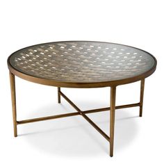 an oval metal coffee table with latticed design on the top and bottom, against a white background