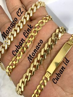 ● Mens 14k Solid Gold Bracelet Monaco Curb Link Cuban ID Engravable Bracelet Fathers Day Gift ●Metal : 14K Yellow Gold ●Purity : 14k with authenticity stamp ●Thickness, Length and Weight: Monaco CZ: 9mm, 8.5", 19 Grams Cuban Link: 8mm, 8", 12.2 Grams Monaco: 10mm, 8.5", 14.4 Grams Cuban ID Link: 7mm, 8", 12 Grams ( FREE Engraving) Message us the font that is needed for engraving. This item is non returnable if engraving is needed. ●Condition : Brand New ●Clasp : Lobster Clasp/ Box CZ Clasp ●Comp Formal Luxury Cuban Link Bracelet, Luxury Gold Plated Classic Cuban Link Bracelet, Polished Yellow Gold Cuban Link Jewelry, Gold Diamond Bracelet With Cuban Link For Formal Occasions, Formal Gold Diamond Bracelet With Cuban Link, Luxury Yellow Gold Diamond Bracelet With Curb Chain, Gift Cuban Link Diamond Bracelet With 17 Jewels, Luxury 14k Gold Cuban Link Chain Bracelet, Luxury Gold Cuban Link Diamond Bracelet