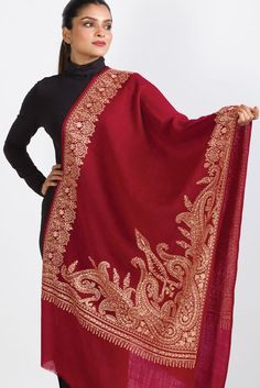 Our Geeta Embroidered Shawl features exquisite embroidery on soft 100% merino wool. With a stunning contemporary design, this classically beautiful shawl showcases the intricate embroidery traditions of Northern India in a range of jewel tones.  The high quality and elegance of our embroidered shawls make them treasures that will last for generations.  -------------------------------- Material: 100% Merino Wool Shape: Rectangle Care: Hand Wash with Gentle Detergent, Hang to Dry Dimensions: 28" x Luxury Elegant Shawl With Intricate Embroidery, Luxury Handloom Traditional Drape Shawl, Luxury Jamawar Pashmina Shawl For Traditional Ceremonies, Luxury Traditional Shawl Scarf, Luxury Dupatta Shawl With Motifs, Luxury Semi-stitched Handloom Shawl, Luxury Elegant Embroidered Pashmina Fabric, Luxury Handmade Shawl For Gift, Elegant Pashmina Dupatta Style Scarf