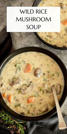 two bowls of wild rice mushroom soup with a wooden spoon