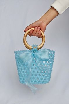 The creation of the Blue Bag involves careful design and handmade craftsmanship, infused with love and patience. ❤️ The bag exudes a considerable amount of grace and charm. ❤️Hello and welcome to my store! 💜This bags are 100% handmade. I hope this bag becomes a vessel for creating wonderful memories. I craft them using high-quality beads and durable threads that are resistant to breakage. 💜Don't hesitate to reach out with any questions by clicking the "Message the seller" button located at the Blue Beaded Bag, Beaded Vase, Infused With Love, Shoe Makeover, Hand Beaded Bag, Acrylic Bag, Bead Bag, Embroidered Handbag, Diy Handbag