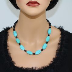 ♥ Ready to ship ♥ 100% handmade ♥ Packed in a gift box ♥ Material - Natural Turquoise, black onyx beads ♥ Custom length ♥ Custom orders are welcome Aqua Blue Turquoise and Black Beads Statement Necklace - the perfect accessory to elevate your style!  Handcrafted with care, this necklace features an exquisite combination of aqua-blue turquoise and black beads, creating a captivating color palette.  The bold design and striking contrast make this piece a true statement maker, sure to turn heads wh Turquoise Beaded Necklaces With Black Beads As Gift, Gift Turquoise Beaded Necklaces With Black Beads, Turquoise Necklace With Black Beads As Gift, Turquoise Jewelry With Black Beads For Gift, Elegant Turquoise Necklace With Polished Beads For Gift, Elegant Turquoise Necklace With Polished Beads As Gift, Elegant Turquoise Jewelry With Black Beads, Handmade Black Turquoise Necklace With Round Beads, Elegant Turquoise Necklace With Faceted Beads As Gift