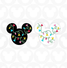 mickey and minnie mouse heads with colorful lights on them