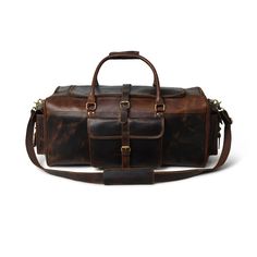 Trustpilot A travel leather duffel bag is a must-have accessory in a men’s wardrobe. This Roosevelt travel duffel bag is handcrafted from thick full-grain buffalo leather to look sophisticated, premium, and stylish. With being eye-catchy this duffel bag is also functional and provides extra storage for your travel necessities and is versatile to be used as a gym bag, overnight weekender, or as a carry-on duffel bag. With a central compartment, this bag has enough space for carrying your clothes, Buffalo Bag, Look Sophisticated, Travel Duffel Bag, Leather Duffel Bag, Leather Duffel, Travel Necessities, Leather Duffle Bag, Dark Chocolate Brown, Leather Duffle