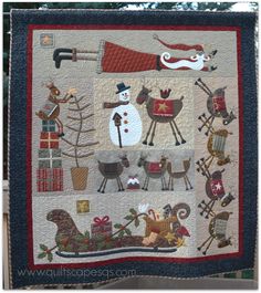 a quilted christmas scene with santa, reindeers, sleigh and snowman