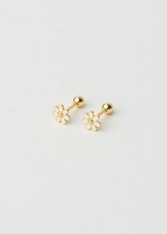 Everyone needs a pair of these sweet flower studs! They’re perfect for wearing alone or mixing and matching with our other earrings for a cute combo. Material: 18K gold plated over 100% 925 Sterling Silver Type: Stud earring with back Hypoallergenic • Nickel-free • For sensitive ears Size specifications: Flower ≈ 5.5mm Rainbow Row, Daisy Studs, Book Art Diy, White Daisy, Flower Studs, Sensitive Ears, Stud Earring, Earring Necklace, Art Diy