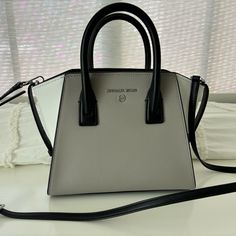 Michael Kors Handbag With Removable Strap. Brand New, Only Used Once. Perfect Condition. Black, Gray And White. No Dust Bag. Michael Kors Handbag, Bags Michael Kors, Handbags Michael Kors, Michael Kors Black, Michael Kors Bag, Grey And White, Black Gray, Satchel, Dust Bag