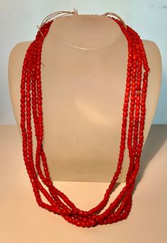 This hand made necklace is very collectible. It was purchased from Lynn Trusdell at her shop in the 1990's. The necklace, made in the 1930's-1940's, is strung simply with string and Mediterranean coral and is in very good condition. It measures 24" long. Weight is 89 grams Perfect for a growing collection. Artisan Red Collectible Necklaces, Red Vintage Hand-strung Jewelry, Unique Hand-strung Multi-strand Necklace, Artisan Multi-strand Hand-strung Necklaces, Red Handmade Necklace For Collectors, Handmade Red Necklaces For Collectors, Sterling Silver Clasp Multi-strand Necklace For Gift, American Jewelry, Native American Jewelry