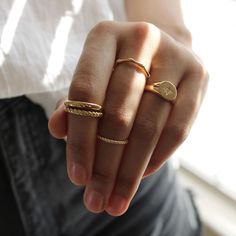 Super cute, minimal gold filled roped stacking ring. This ring features a delicate 1mm twisted band. It is water friendly but note- it is dainty and meant to pair with others for added durability. Available in whole sizes 5-9. Materials: 14k Gold Filled Band Width: 1mm Hypoallergenic. Nickel and lead free. What does Gold-Filled mean? Gold filled jewelry contains 1/20th (5%) of real gold content, or more than 100x real gold content that most gold plated jewelry. The process to make gold-filled je Gold Rings Classy, Minimalist Twisted Yellow Gold Ring, Minimalist Twisted Gold Rings, Minimalist Adjustable Twisted Rings, Minimalist Twisted Rings For Everyday, Minimalist Twisted Rings For Everyday Wear, Minimalist Twisted Everyday Rings, Simple 14k Gold Filled Stackable Rings, Minimalist Twisted Yellow Gold Jewelry