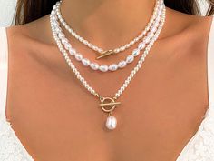 ✨ Discover the allure of timeless elegance with our IngeSight.Z 3-Piece Faux Pearl Necklace Set! This stunning collection features multilayered strands of faux pearls, creating a captivating choker that's perfect for any occasion. 🌟💫 With its glamorous OT clasp and sophisticated design, this necklace set is a must-have for any jewelry lover looking to make a statement. Whether you're dressing up for a special event or adding a touch of luxury to your everyday outfits, these layered pearls will add the perfect finishing touch. 💎✨ 🌟 Features: Set Includes: 3-Piece Faux Pearl Necklace Set Clasp: Elegant OT Clasp Design: Multilayered for a Glamorous Look Style: Perfect for Women's Fashion 🎁 Why You'll Love It: Elegant Layers: Multiple layers of pearls create a luxurious, eye-catching effe Layered Pearls, Layered Pearl Necklace, Pearl Necklace Set, Everyday Chic, Faux Pearl Necklace, Sophisticated Design, Jewelry Lover, Statement Jewelry, Multi Layering