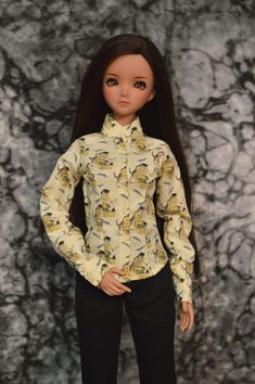 These blouses are modeled on Smart Doll with either the default or medium bust to show that they fit both sizes. Please take note of the details in the photos. All are long-sleeved with button fronts and cuffs(real working buttons with buttonholes). Mandarin collar, yoked back, shirttail hem and princess seamed front are a few of the design details. Fabric is washed cotton and colorfast. NOTE: To dress Smart Doll, no need to unbutton buttons. Simply remove her head and hands to put on over her t Casual Fitted Blouse With Doll Collar, Classic Fitted Blouse With Doll Collar, Fitted Spring Shirt With Doll Collar, Fitted Shirt With Doll Collar For Spring, Fitted Shirt With Peter Pan Collar For Spring, Dress Smart, Doll Blouse, Plastic Shoes, Smart Doll